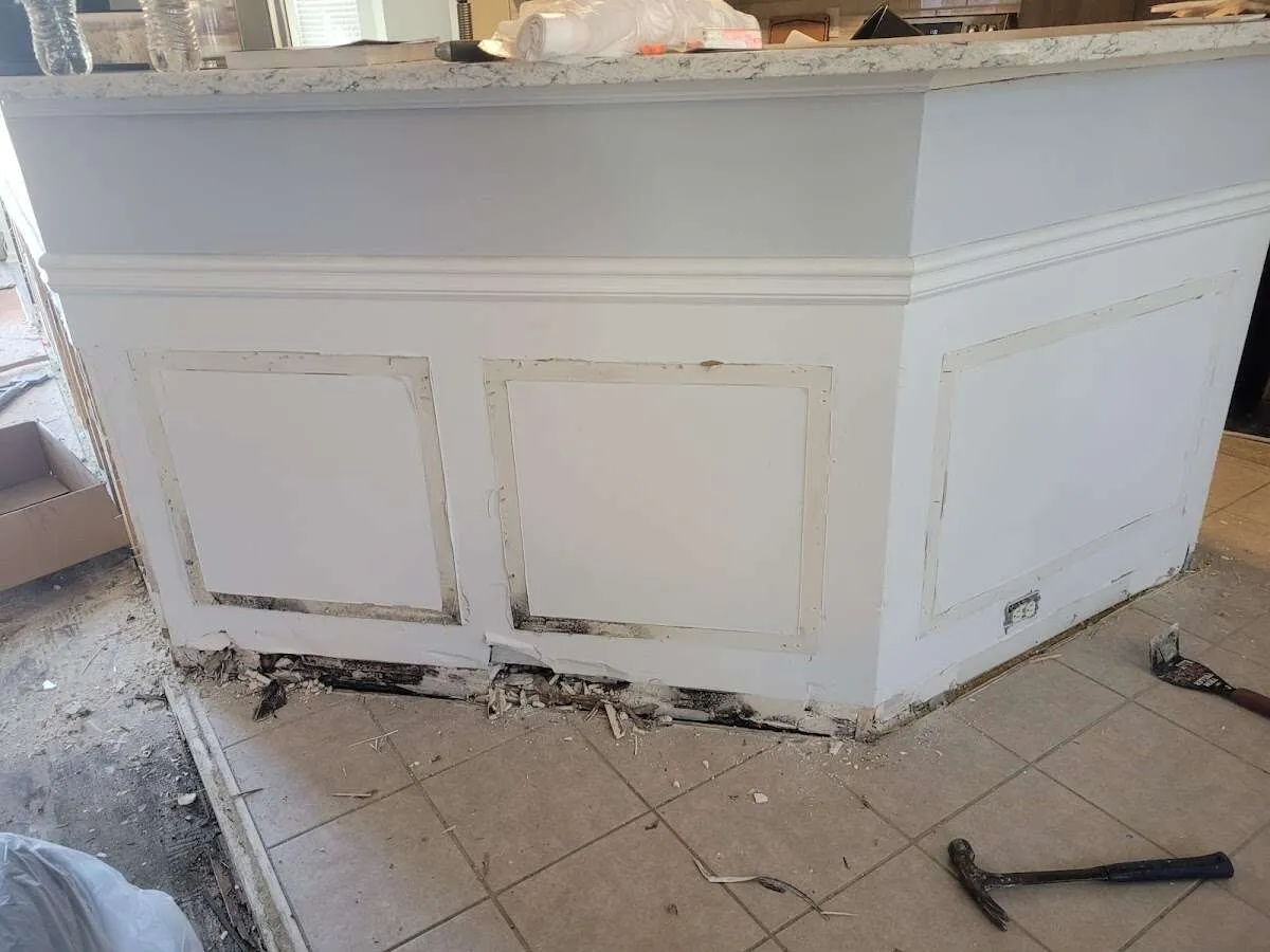 Water damage and mold on kitchen during Storm Damage Restoration in Winter Beach